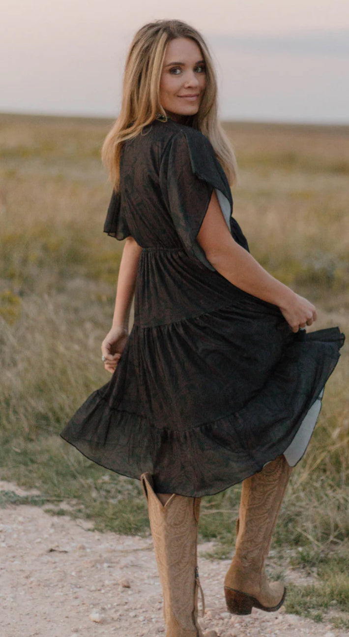 The TOOLED IN BLACK DRESS